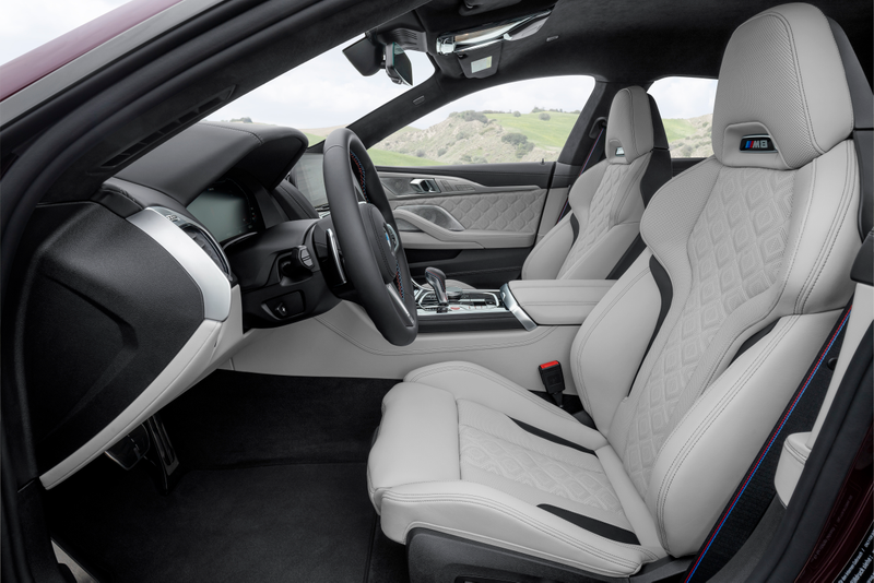 Illustration for article titled Just look how purple this 600 hp BMW M8 Gran Coupe is